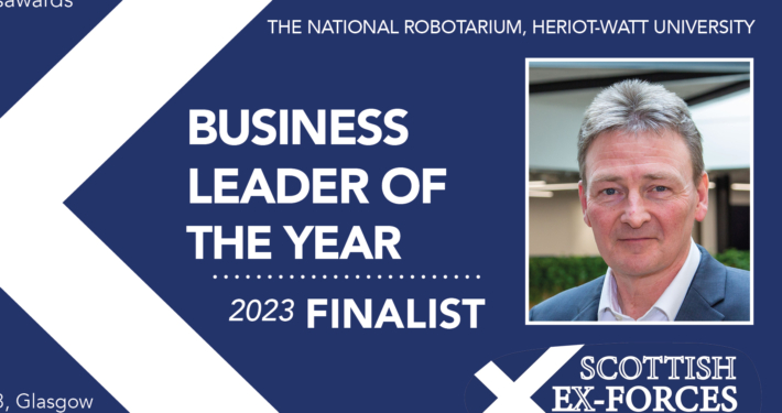 An image of a saltire and focus on head and shoulders of man in shirt and jacket. The typography is white and says 'Business Leader of the Year Finalist'.