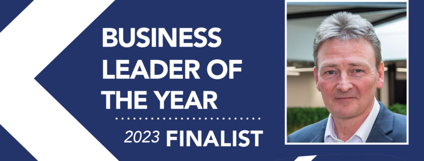 An image of a saltire and focus on head and shoulders of man in shirt and jacket. The typography is white and says 'Business Leader of the Year Finalist'.